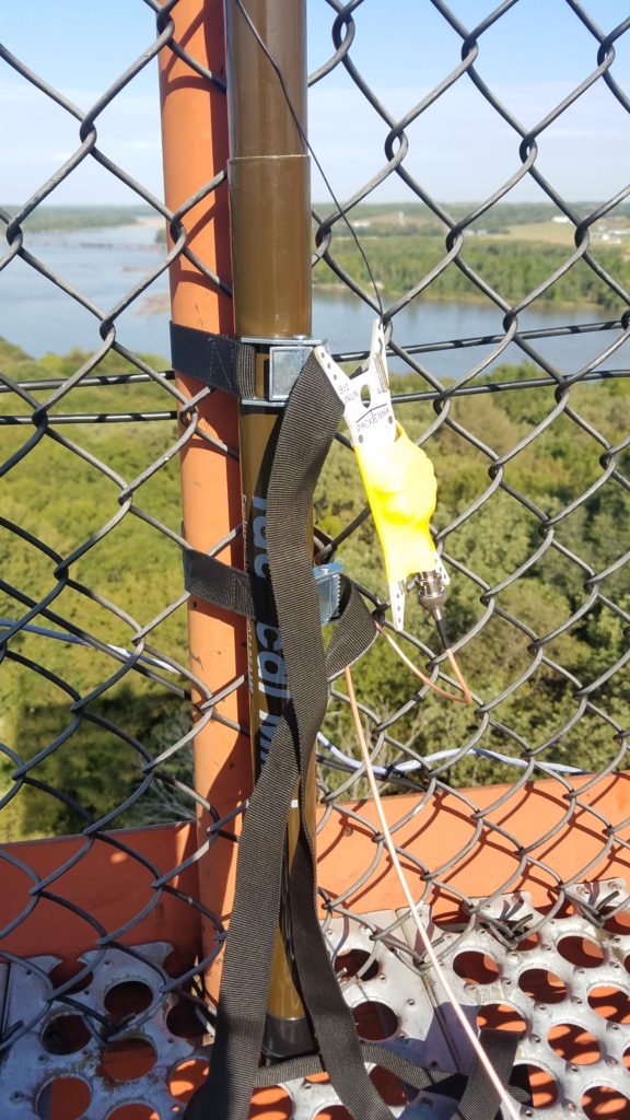 The mast is secured to the tower, and the PackTenna mini random wire antenna is attached to the mast.