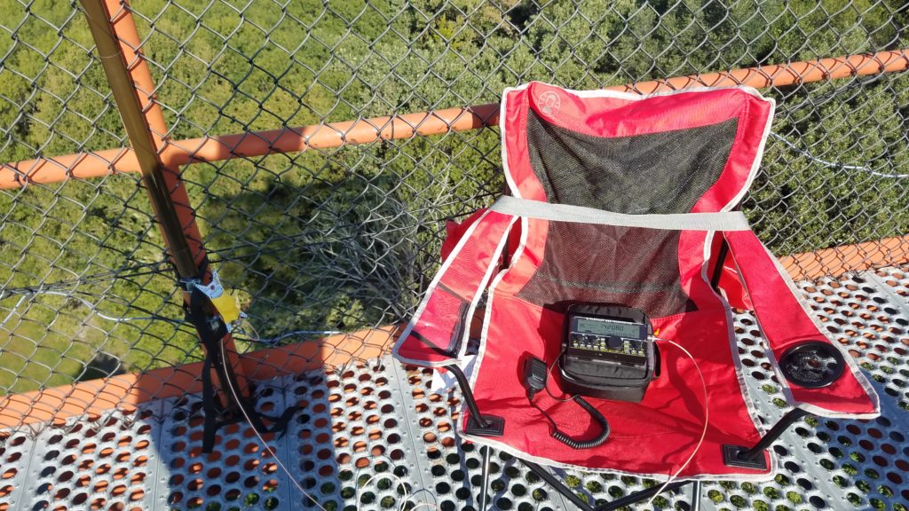My operating position on top of the observation tower - the Elecraft KX2 HF radio transceiver attached to the PackTenna mini random wire antenna.