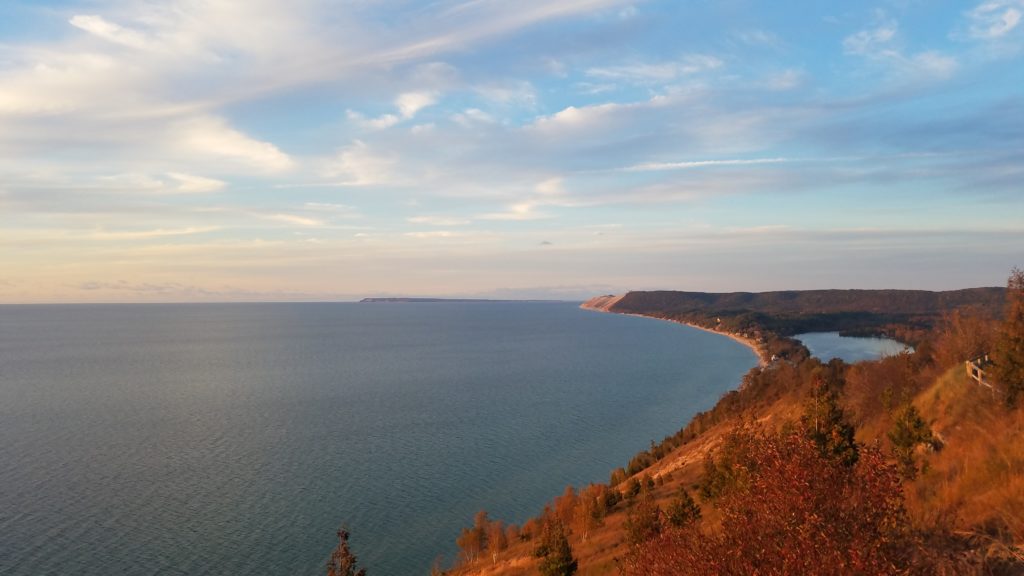 View of the Lake Michigan and the Sleeping Bear Dunes National Lakeshore at sunset.