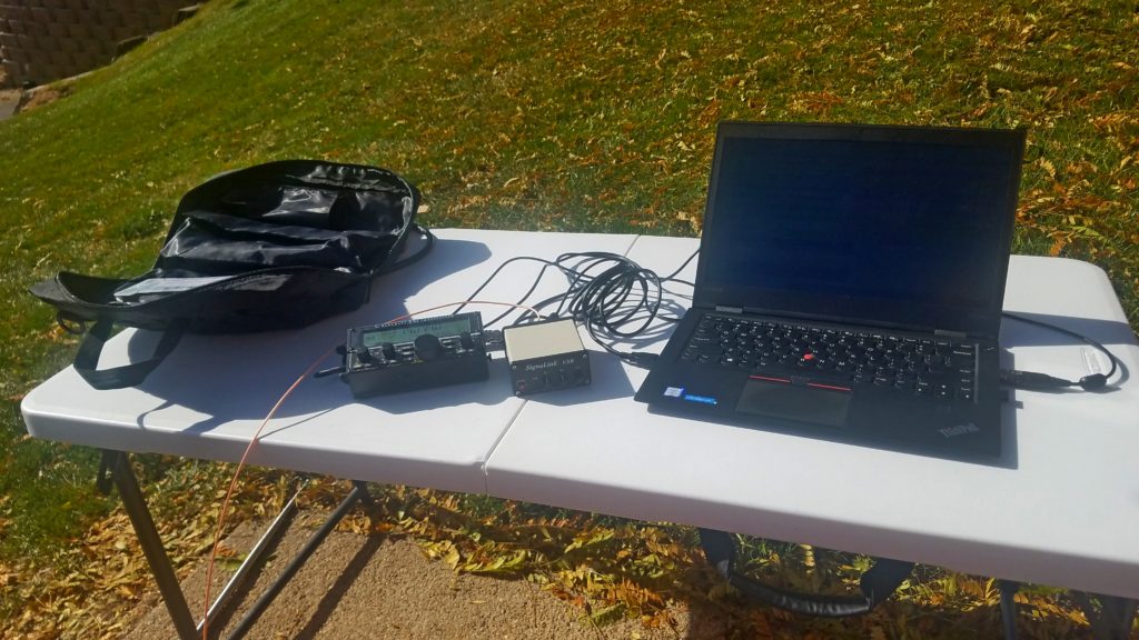 Elecraft KX2 with SignaLink USB, CAT cable and audio cable hooked to the laptop for FT8 digital operation on HF.